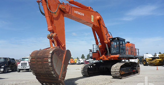 2012 Hitachi EX1200-6 hydraulic excavator sold at a Ritchie Bros. heavy equipment and truck auction. 2012 Hitachi EX1200-6 hydraulic excavator sold at a Ritchie Bros. heavy equipment and truck auction.